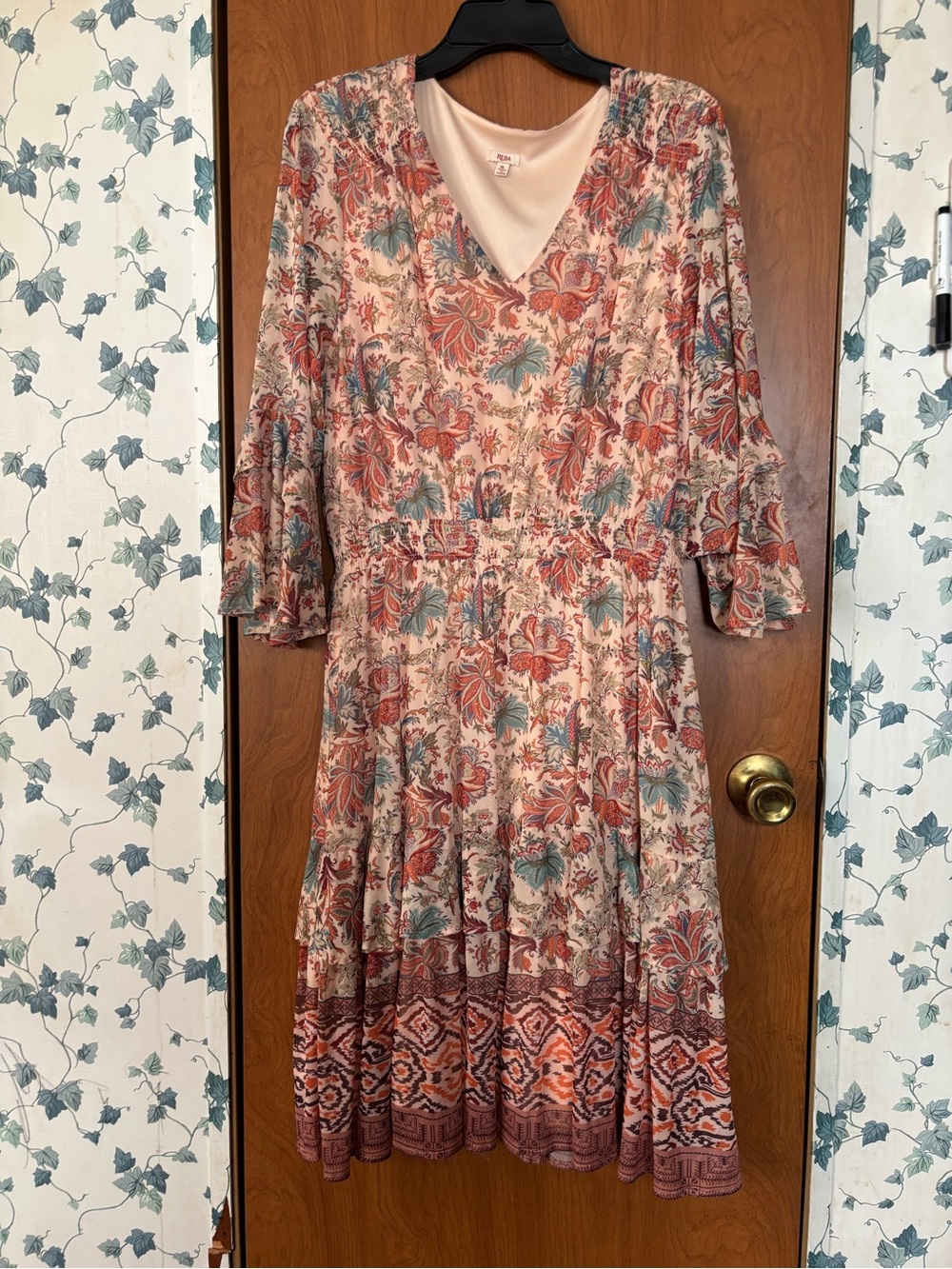 Reba Floral V‑Neck Tiered Midi Dress in Cream, Rust, and Teal